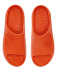 Pair of orange Chupster with rubberized sole with textured upper on a white background