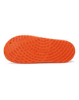 Orange Chupster with rubberised sole and textured pattern on a white background