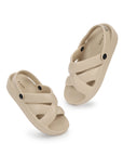 Light brown clogs with sleek design on white background