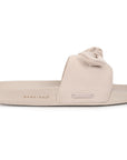 Side profile of lightweight peach-beige women’s casual sliders by Chupps