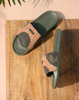 Relaxed fit sliders on feet outdoors
