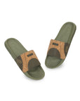 Relaxed fit sliders on feet outdoors