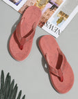 Peach flip-flops for women top view with floral flip-flop