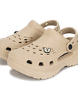 An adjustable heel strap allows for a secure fit, making them suitable for both indoor and outdoor use.