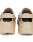 An adjustable heel strap allows for a secure fit, making them suitable for both indoor and outdoor use.
