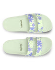 Close-up of floral detail on lime strap