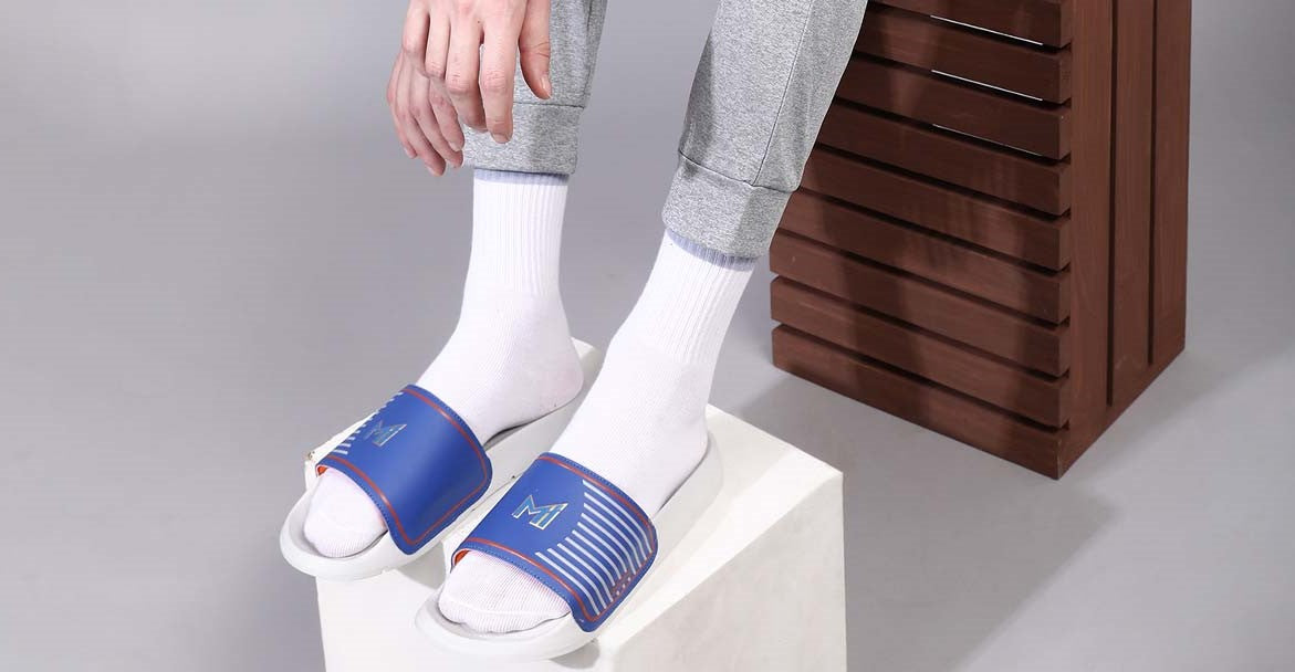 Why do people think wearing Sliders with Socks is cool?