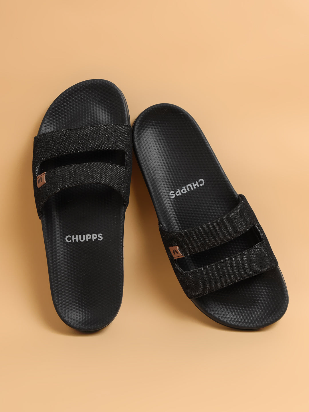 women’s black denim slides on coffee colour background