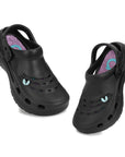 Black clogs with colorful interior on a white background