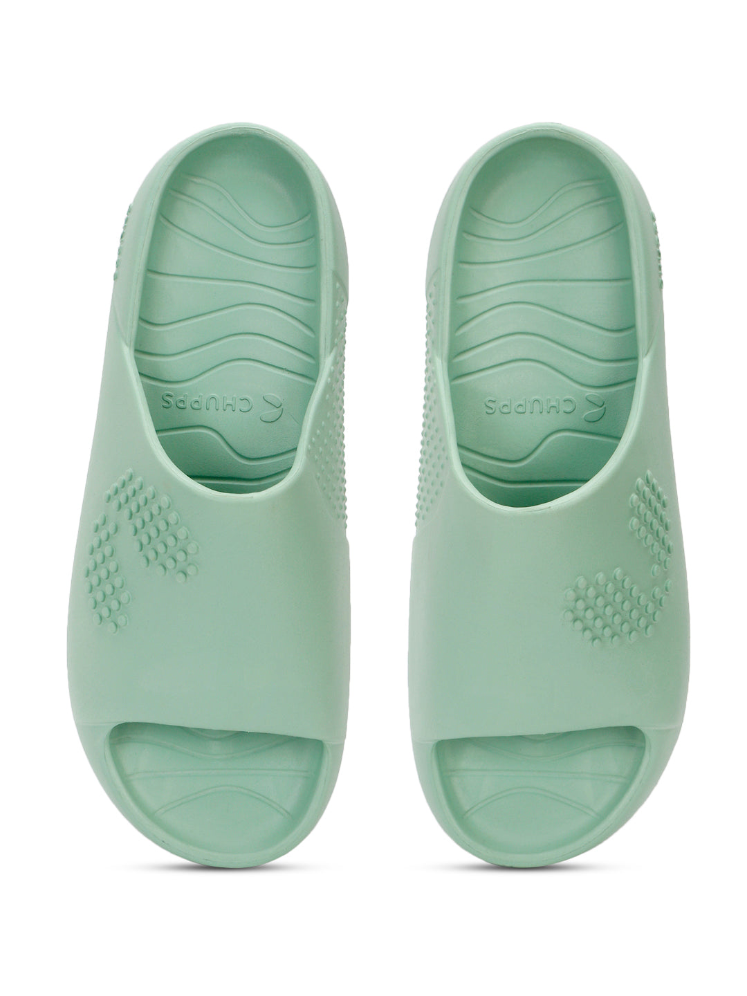 POV Top shot of pista green chupster with dot pattern on a white background