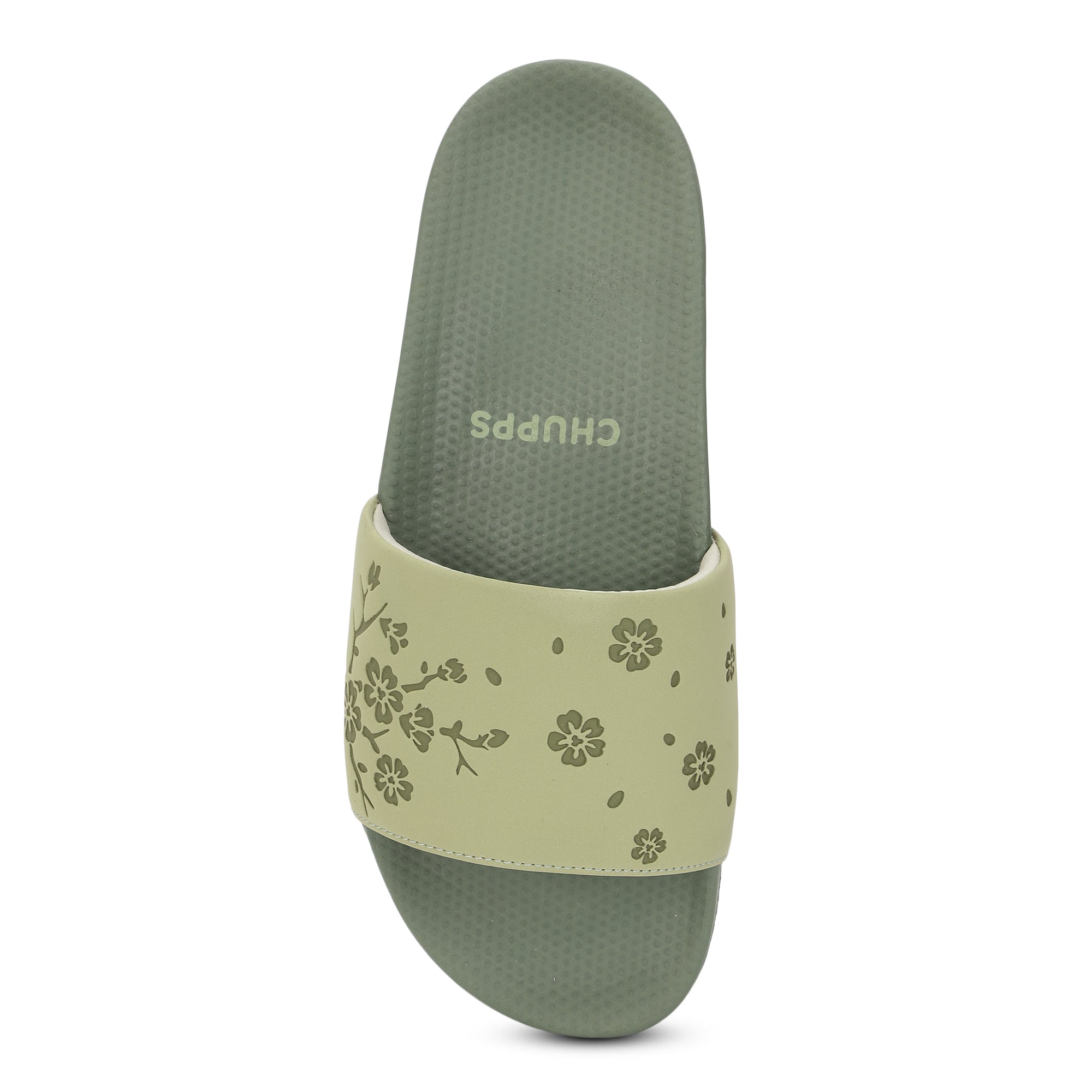 Close-up of traction outsole on Pista Green sliders for steady steps.