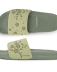 Side  and top view of Pista Green sliders highlighting slim strap and minimal profile.