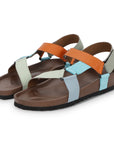 Pair of sandals with multicolored straps on a white background