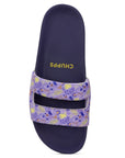 Navy slide sandal with a colorful strap featuring butterfly designs on a white background