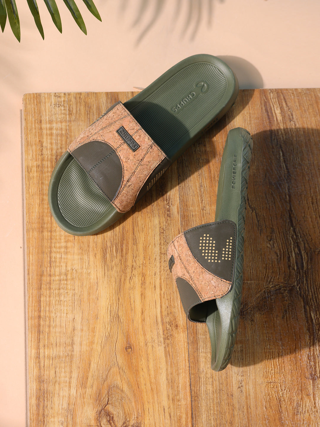 Relaxed fit sliders on feet outdoors