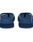 Navy blue flip-flops showing sole thickness
