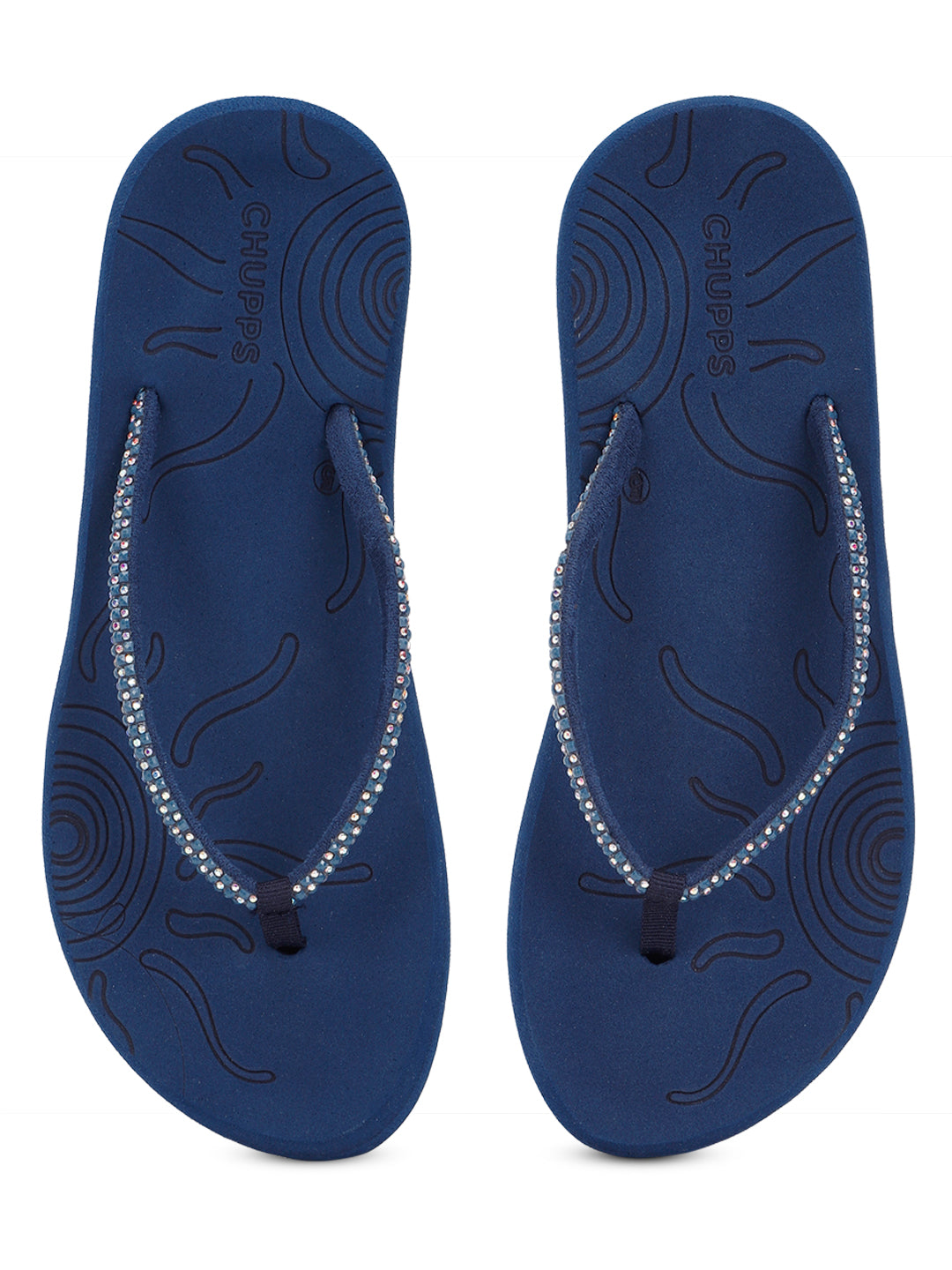 Navy blue flip-flops displaying footbed pattern and design