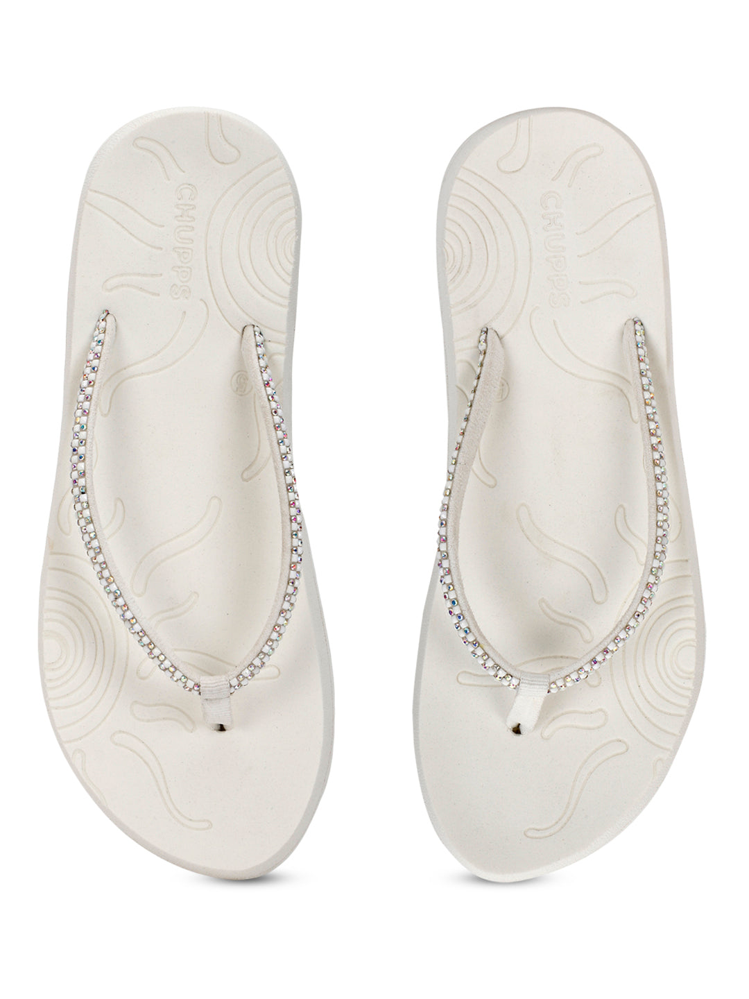 Overhead and underside view highlighting textured sole and comfy footbed of Solis White
