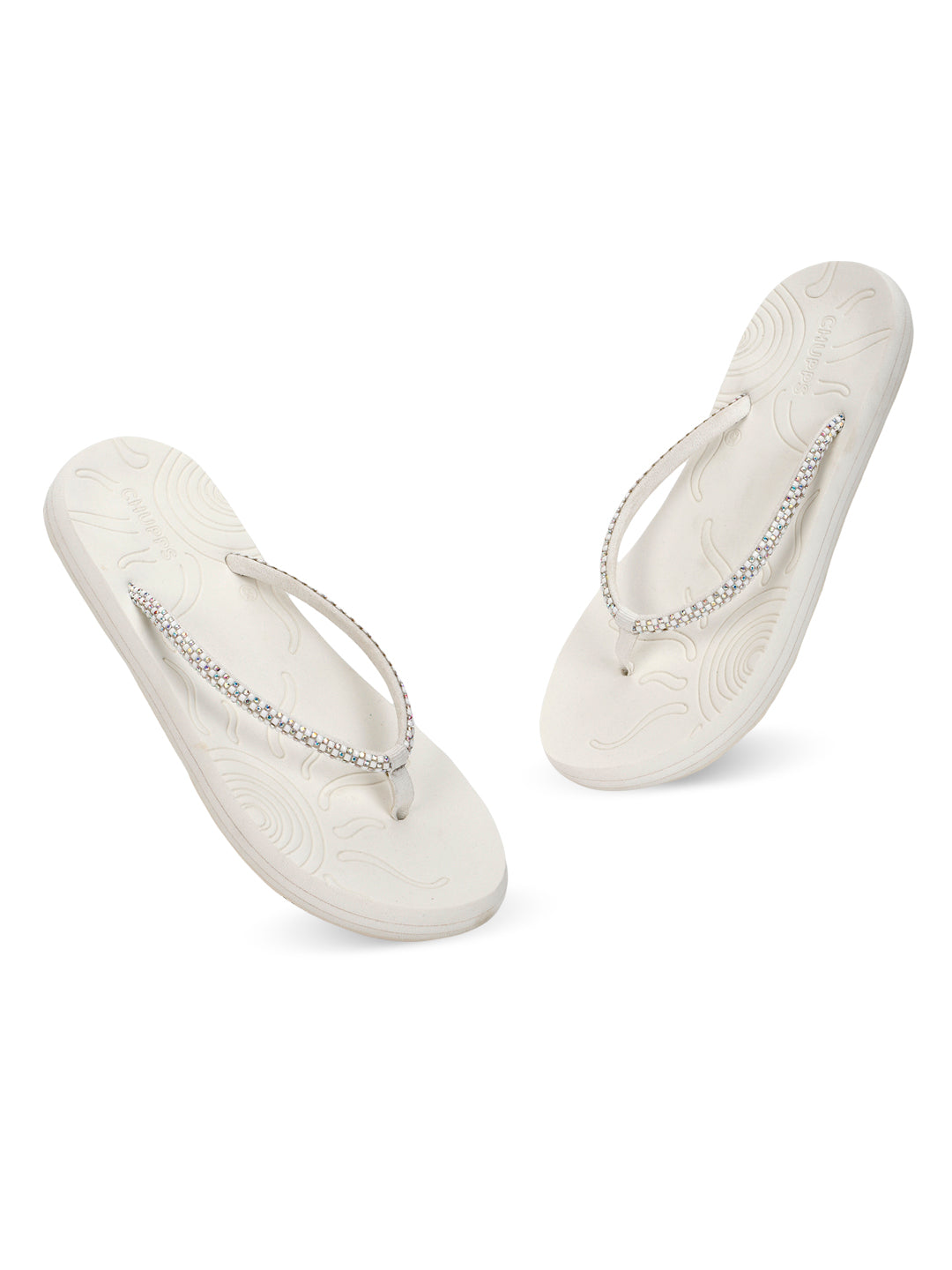 Close-up of white V-strap with fine embellishments for a touch of effortless glam