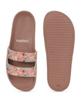 Top-close image of floral print, curved upper and sole