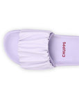 Close-up of the gathered strap seam and ruffle texture on the lavender upper.