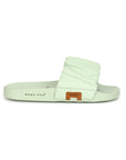 Light green sandal with subtle Chupps side label on a white background