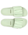 Top-down shot of Ruffel light green slider showing silhouette and material texture.
