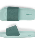 Chupps lime green sliders side view showcasing branded upper strap